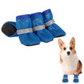 Close-up of the flexible, anti-slip rubber sole and adjustable reflective strap on a small summer puppy bootie.